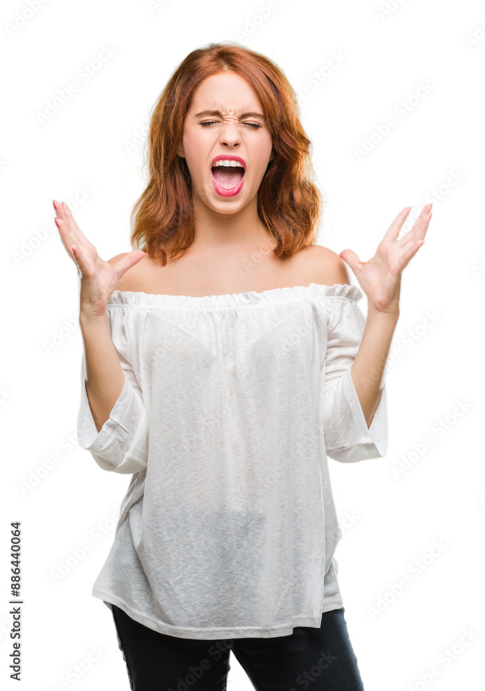 Young beautiful woman over isolated background celebrating mad and crazy for success with arms raised and closed eyes screaming excited. Winner concept Young beautiful woman over isolated background celebrating mad and crazy for success with arms raised and closed eyes screaming excited. Winner concept