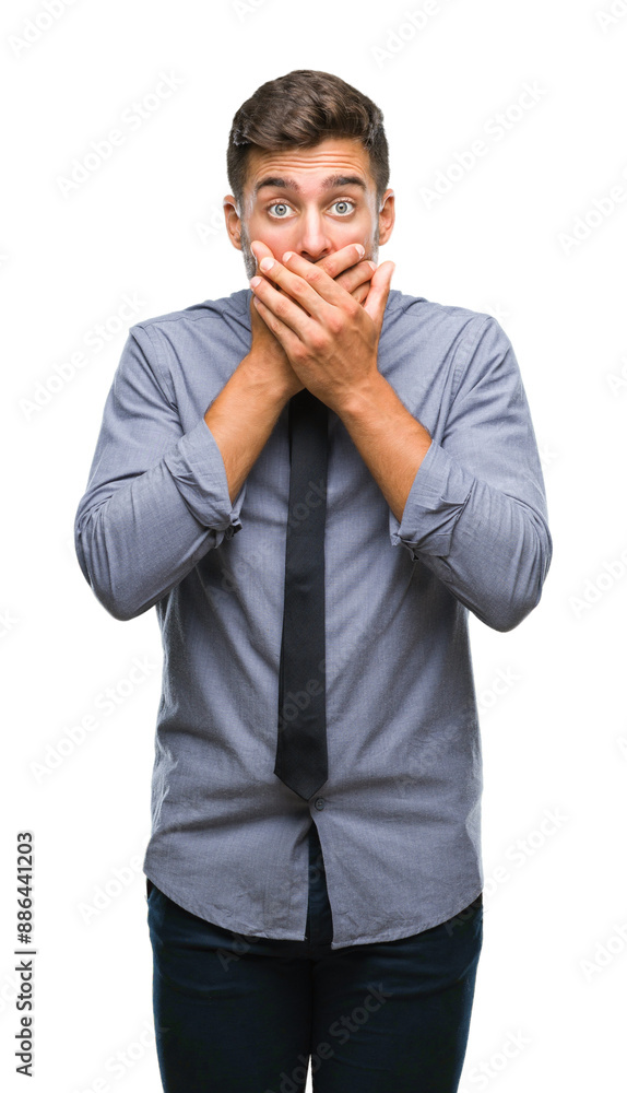 Young handsome business man over isolated background shocked covering mouth with hands for mistake. Secret concept. Young handsome business man over isolated background shocked covering mouth with hands for mistake. Secret concept.