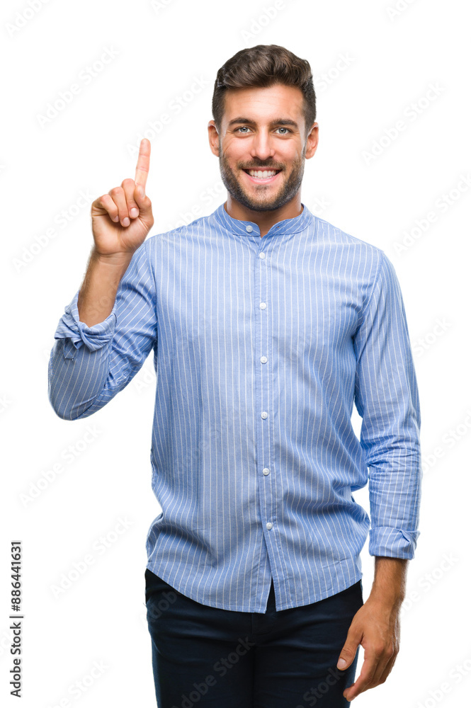 Young handsome man over isolated background showing and pointing up with finger number one while smiling confident and happy. Young handsome man over isolated background showing and pointing up with finger number one while smiling confident and happy.