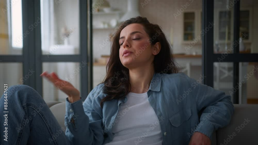 Overheated Caucasian woman on sofa couch wave hand refresh tired cool with arms unhappy sweaty lady girl female suffer of high temperature problem feel sweat at hot living room without air conditioner Overheated Caucasian woman on sofa couch wave hand refresh tired cool with arms unhappy sweaty lady girl female suffer of high temperature problem feel sweat at hot living room without air conditioner