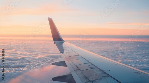 A close-up of an airplane wing against a clear sky, with space for overlaying text and images
