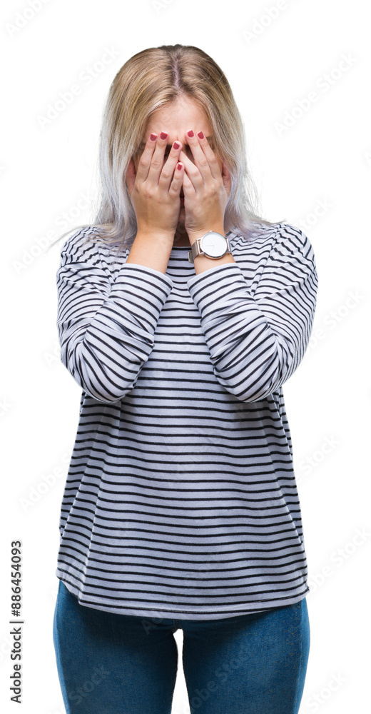 Young blonde woman over isolated background with sad expression covering face with hands while crying. Depression concept. Young blonde woman over isolated background with sad expression covering face with hands while crying. Depression concept.