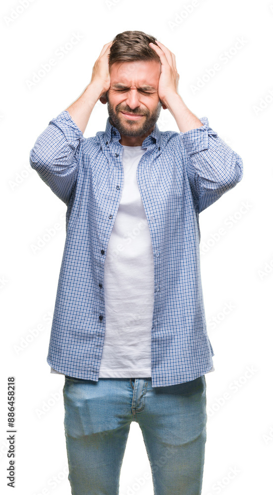 Young handsome man wearing white t-shirt over isolated background suffering from headache desperate and stressed because pain and migraine. Hands on head. Young handsome man wearing white t-shirt over isolated background suffering from headache desperate and stressed because pain and migraine. Hands on head.