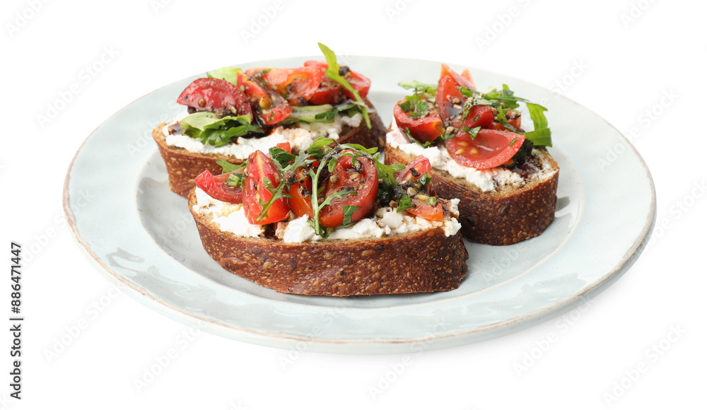Delicious bruschettas with ricotta cheese, tomatoes and arugula isolated on white Delicious bruschettas with ricotta cheese, tomatoes and arugula isolated on white