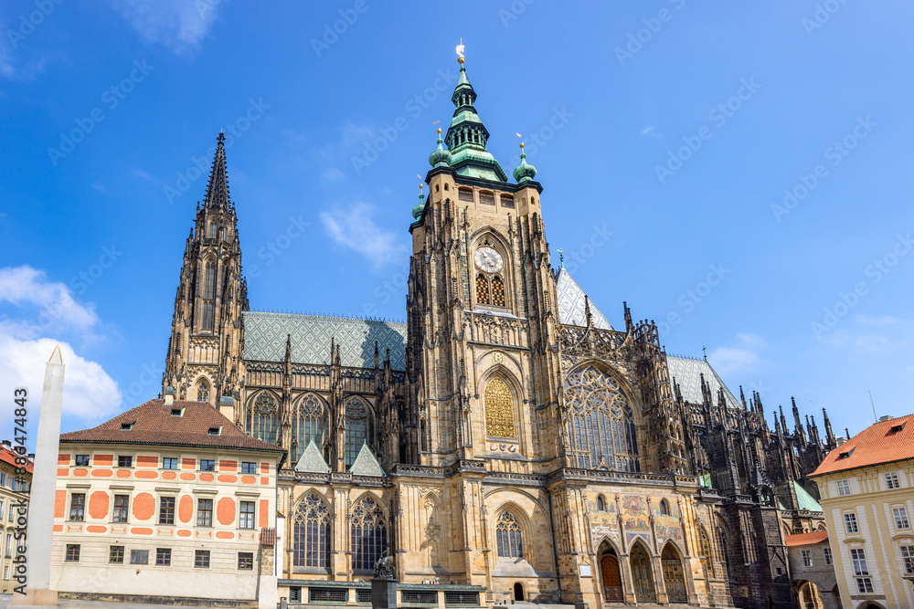 Obraz premium The Metropolitan Cathedral of Saints Vitus, Wenceslaus and Adalbert, a Catholic metropolitan cathedral in Prague, commonly named only as St. Vitus Cathedral is sited in Prague Castle
