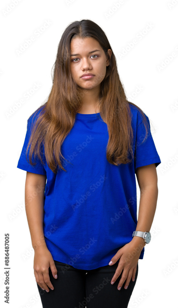 Young beautiful brunette woman wearing blue t-shirt over isolated background Relaxed with serious expression on face. Simple and natural looking at the camera. Young beautiful brunette woman wearing blue t-shirt over isolated background Relaxed with serious expression on face. Simple and natural looking at the camera.
