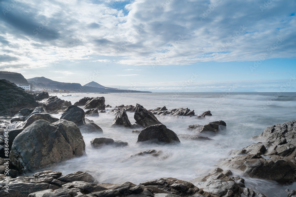 Long exposure seascape in the coast of Arucas. Gran Canaria. Canary islands. spain Long exposure seascape in the coast of Arucas. Gran Canaria. Canary islands. spain