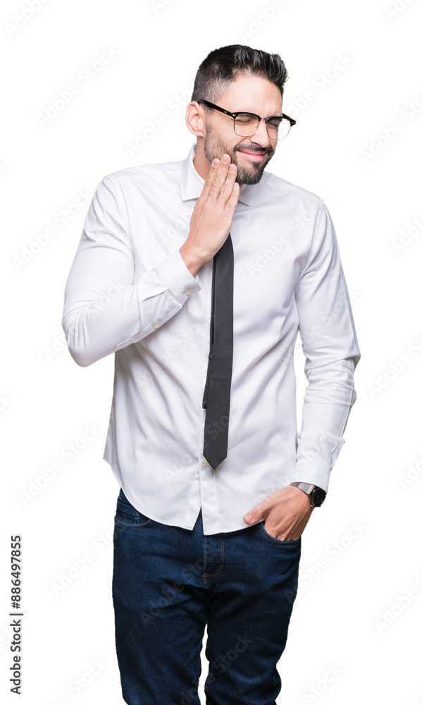 Young handsome business man wearing glasses over isolated background touching mouth with hand with painful expression because of toothache or dental illness on teeth. Dentist concept. Young handsome business man wearing glasses over isolated background touching mouth with hand with painful expression because of toothache or dental illness on teeth. Dentist concept.