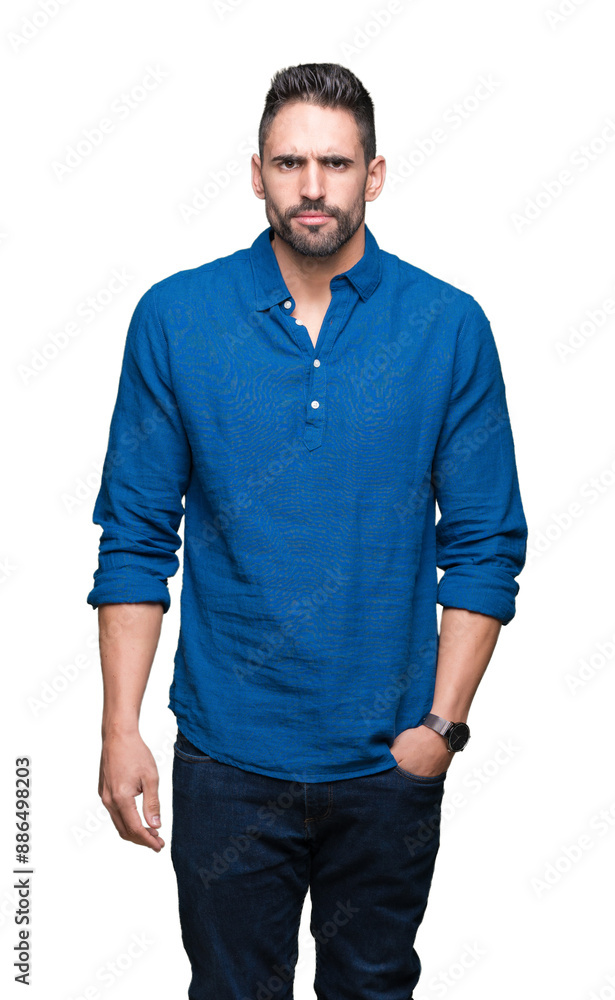 Young handsome man over isolated background skeptic and nervous, frowning upset because of problem. Negative person. Young handsome man over isolated background skeptic and nervous, frowning upset because of problem. Negative person.