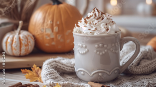 Wallpaper Mural Cozy pumpkin spice latte with whipped cream on a table, set in a warmly decorated autumn room. Perfect for capturing the essence of fall. Torontodigital.ca