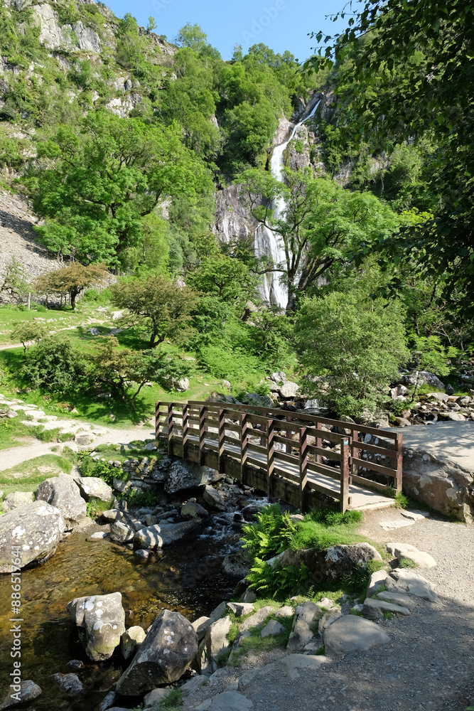 Footbridge at Aber Falls, part of Afron Goch, in the foothills of the Carneddau range, Snowdonia, North Wales. Footbridge at Aber Falls, part of Afron Goch, in the foothills of the Carneddau range, Snowdonia, North Wales.