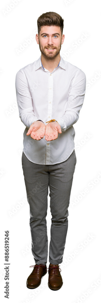 Young handsome business man Smiling with hands palms together receiving or giving gesture. Hold and protection Young handsome business man Smiling with hands palms together receiving or giving gesture. Hold and protection