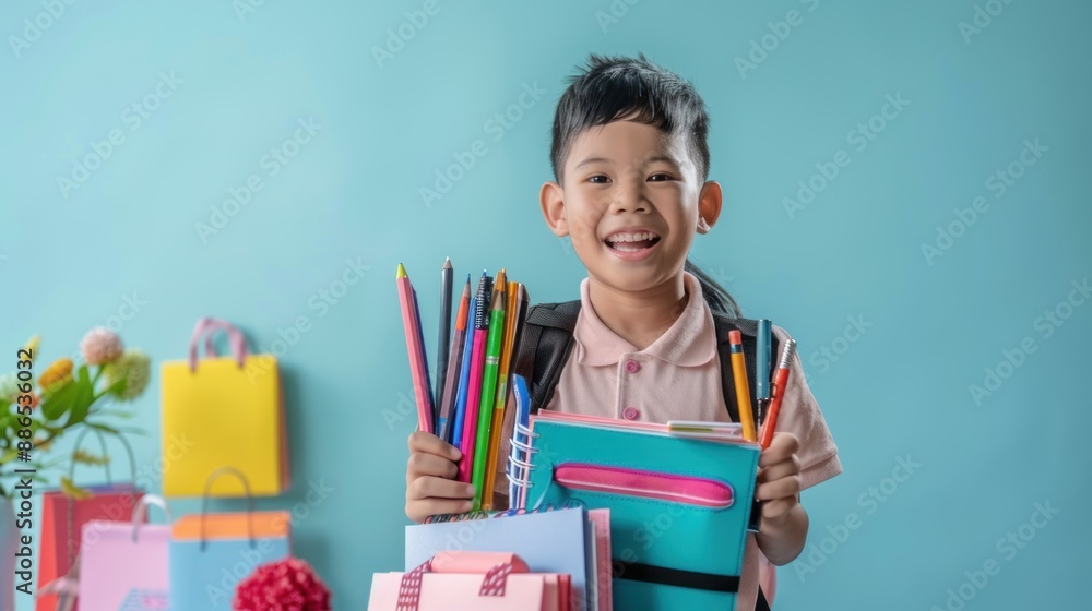 Boy excitedly shopping for stationery items for his first day at school with minimalist background Boy excitedly shopping for stationery items for his first day at school with minimalist background