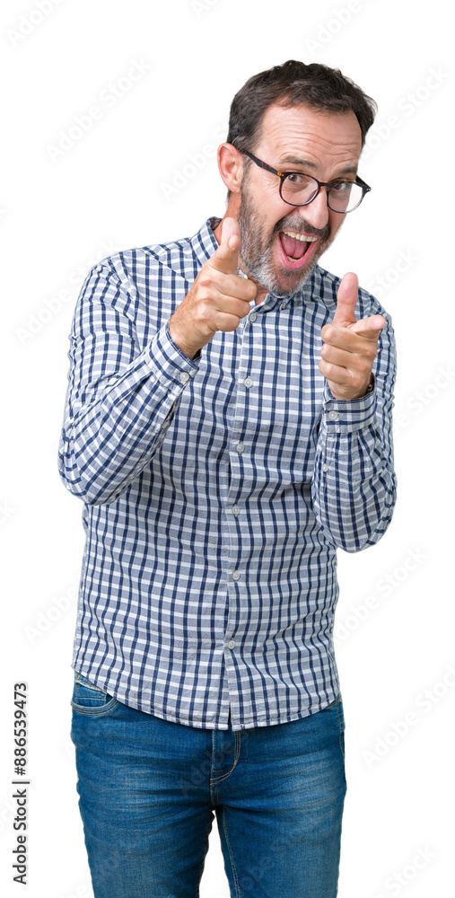 Naklejka premium Handsome middle age elegant senior business man wearing glasses over isolated background pointing fingers to camera with happy and funny face. Good energy and vibes.
