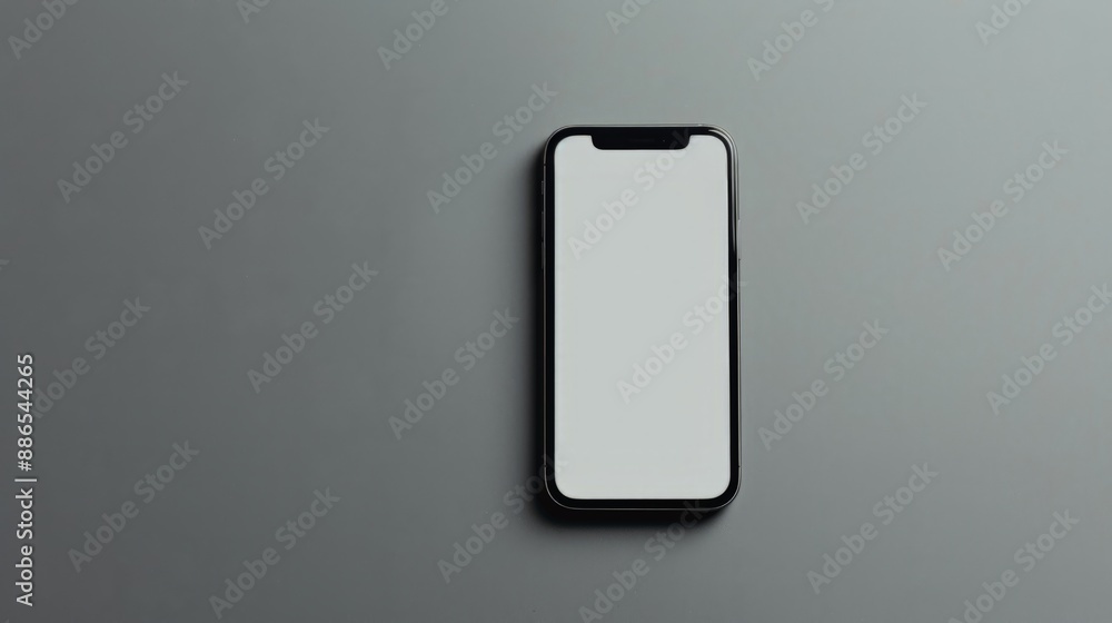 Smartphone with blank screen on gray surface, modern technology concept, minimalistic style, horizontal image, place for text Smartphone with blank screen on gray surface, modern technology concept, minimalistic style, horizontal image, place for text