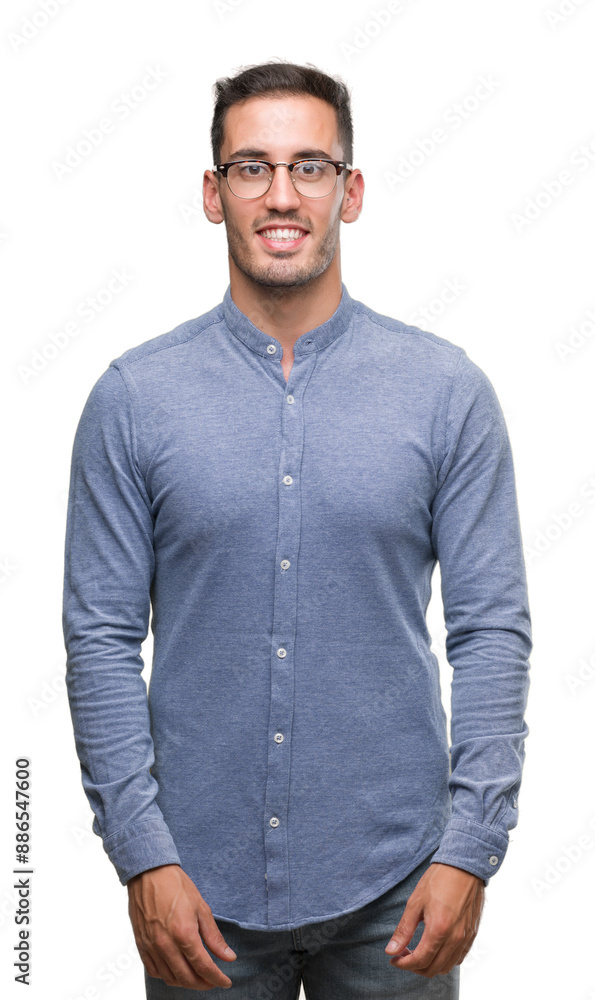 Handsome young elegant man wearing glasses with a happy and cool smile on face. Lucky person. Handsome young elegant man wearing glasses with a happy and cool smile on face. Lucky person.