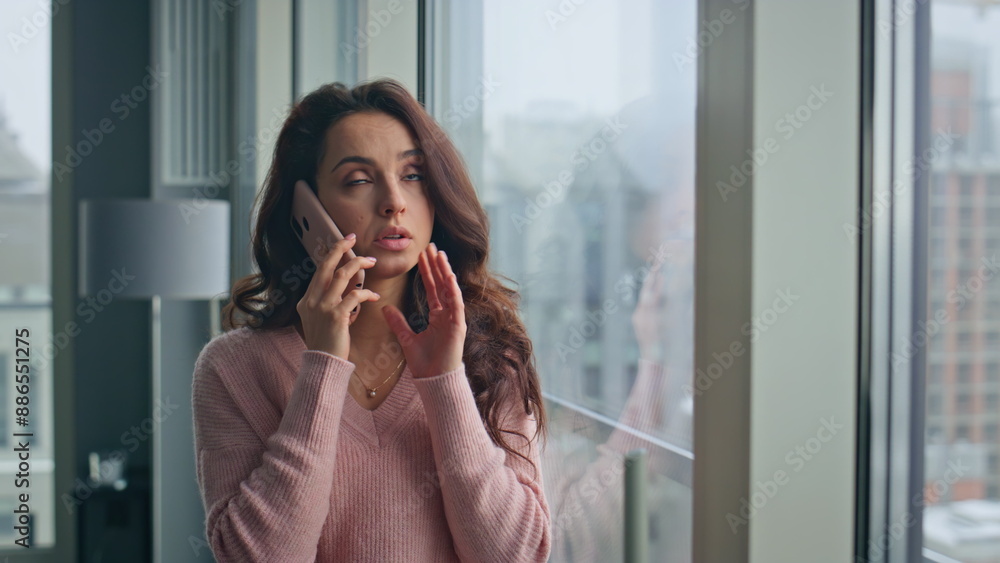 Worried girl talking phone in gloomy windows cityscape closeup. Frustrated lady Worried girl talking phone in gloomy windows cityscape closeup. Frustrated lady