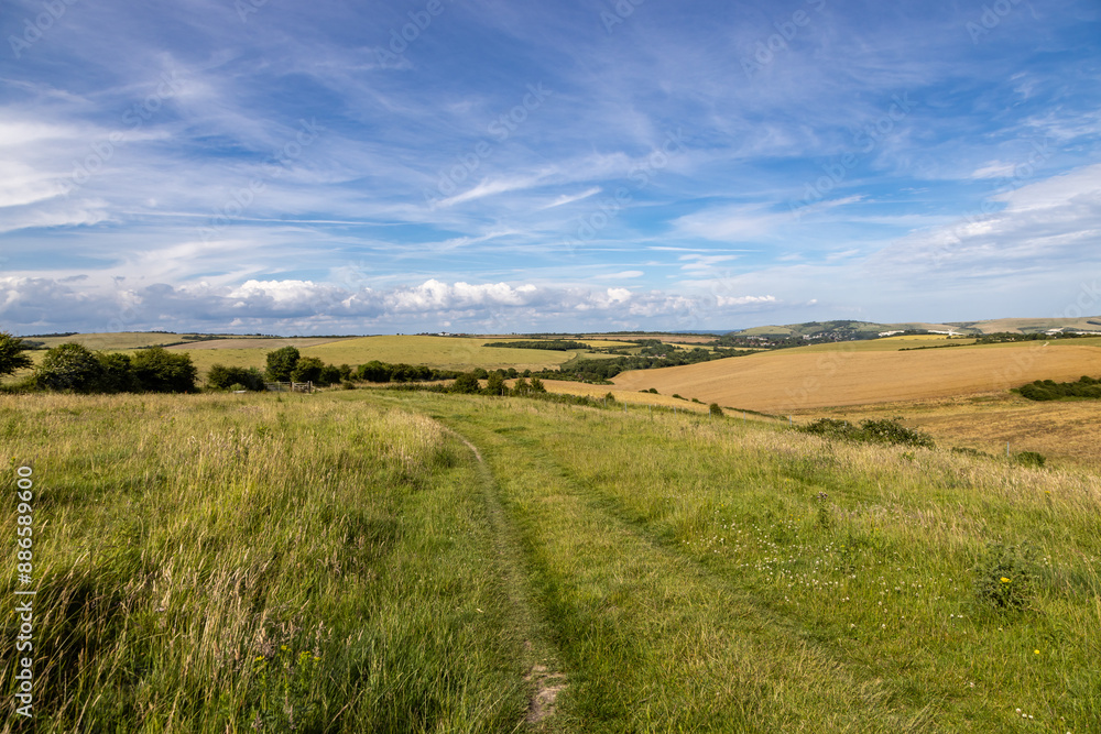Looking out over fields in rural Sussex, along the South Downs Way Looking out over fields in rural Sussex, along the South Downs Way