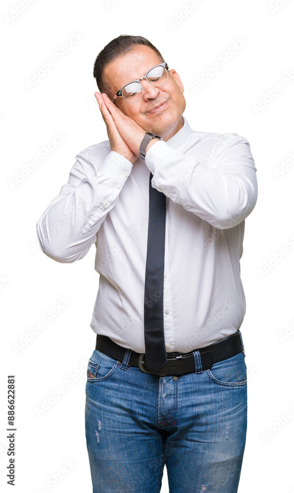 Middle age bussines arab man wearing glasses over isolated background sleeping tired dreaming and posing with hands together while smiling with closed eyes. Middle age bussines arab man wearing glasses over isolated background sleeping tired dreaming and posing with hands together while smiling with closed eyes.