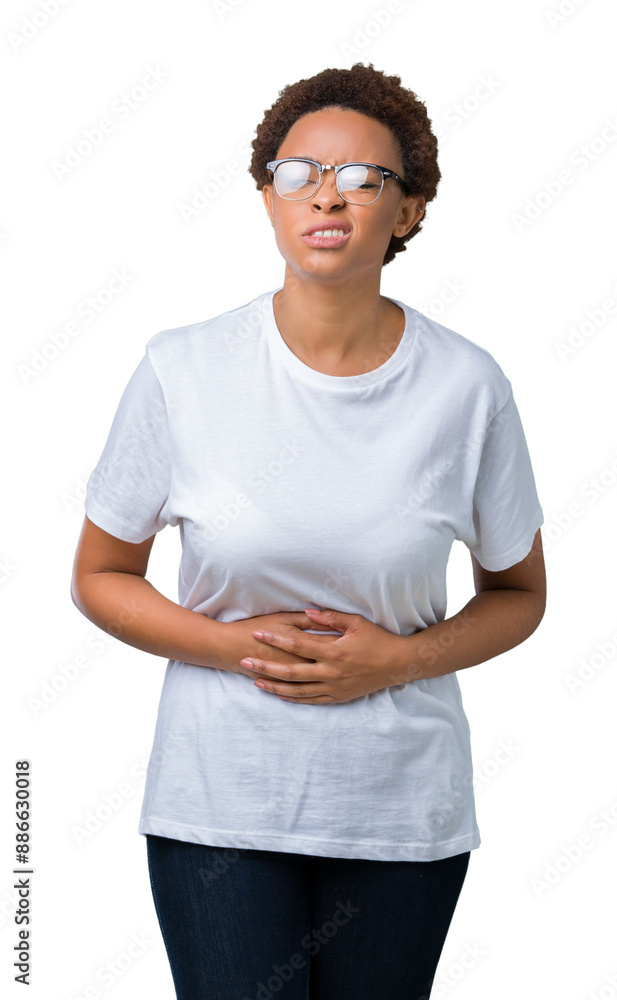 Beautiful young african american woman wearing glasses over isolated background with hand on stomach because indigestion, painful illness feeling unwell. Ache concept. Beautiful young african american woman wearing glasses over isolated background with hand on stomach because indigestion, painful illness feeling unwell. Ache concept.