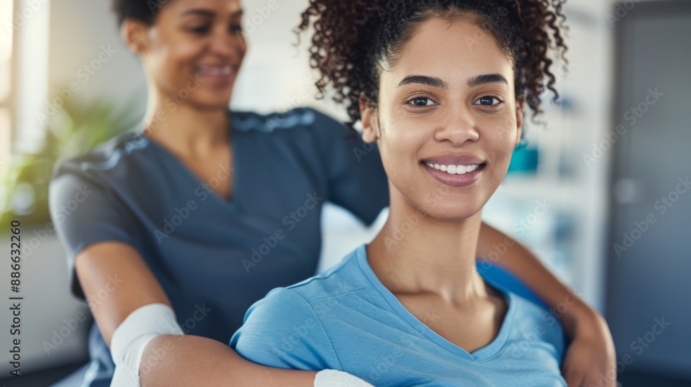 A woman receiving physical therapy for rehabilitation after an injury