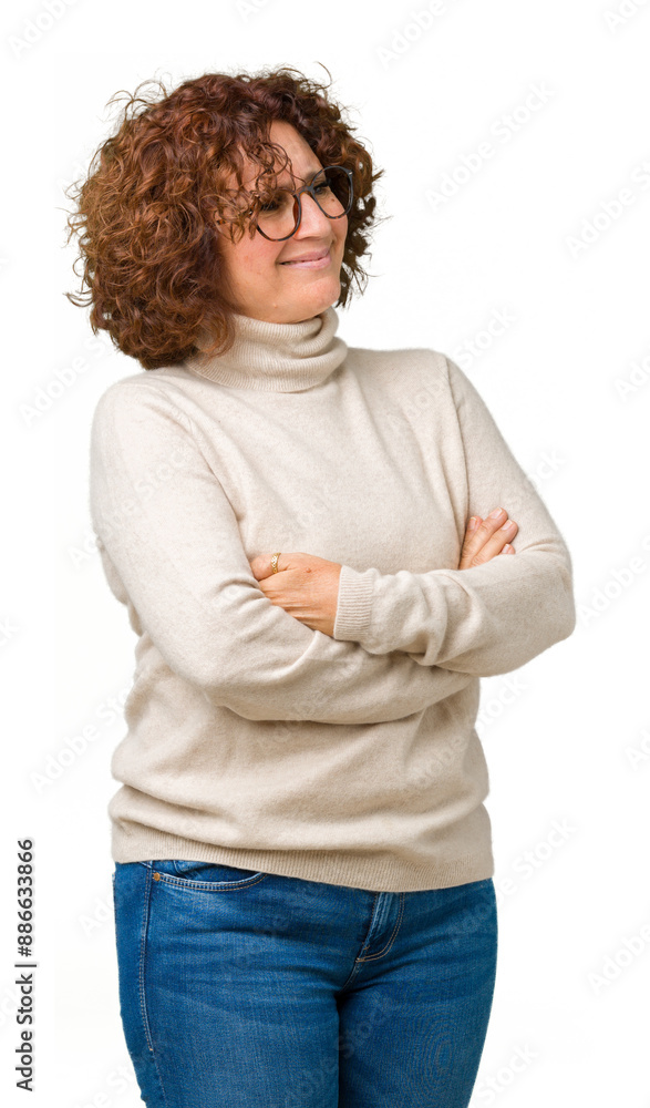 Beautiful middle ager senior woman wearing turtleneck sweater and glasses over isolated background smiling looking to the side with arms crossed convinced and confident Beautiful middle ager senior woman wearing turtleneck sweater and glasses over isolated background smiling looking to the side with arms crossed convinced and confident