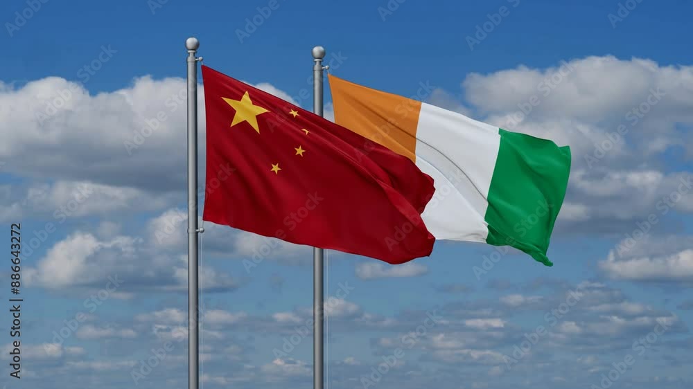 Ivory Coast or Cote d'Ivoire and China flags flying together, video concept of the relationship, two country cooperation concept Ivory Coast or Cote d'Ivoire and China flags flying together, video concept of the relationship, two country cooperation concept