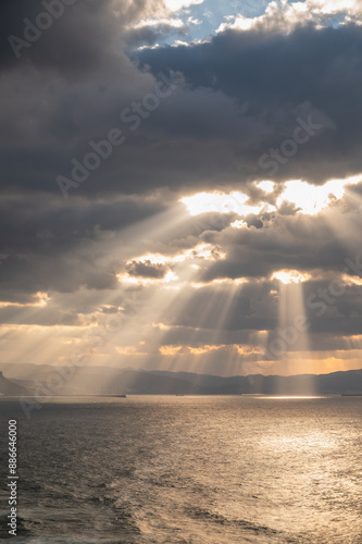 Wallpaper Mural sunset over the ocean with light beams in Spain Torontodigital.ca