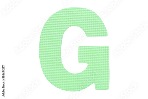 Jigsaw foam plastic green English uppercase "G" alphabet isolated on cut out PNG or transparent background. Character. Colorful foam alphabet puzzle pieces used in learning education for children.