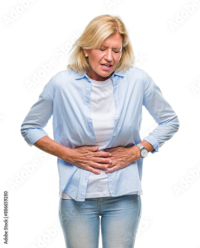 Middle age blonde woman over isolated background with hand on stomach because indigestion, painful illness feeling unwell. Ache concept.