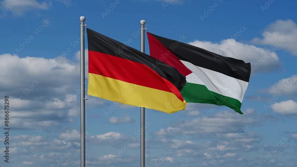 Palestine and Gaza Strip and Germany two flags waving together on blue sky, looped video Palestine and Gaza Strip and Germany two flags waving together on blue sky, looped video