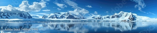 Snowy Mountain Range Reflecting on a Calm Antarctic Water