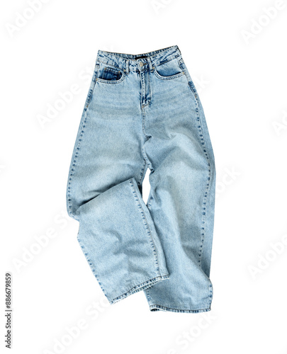 Crumpled wide leg jeans isolated on white. Woman denim trousers, baggy style jeans. photo