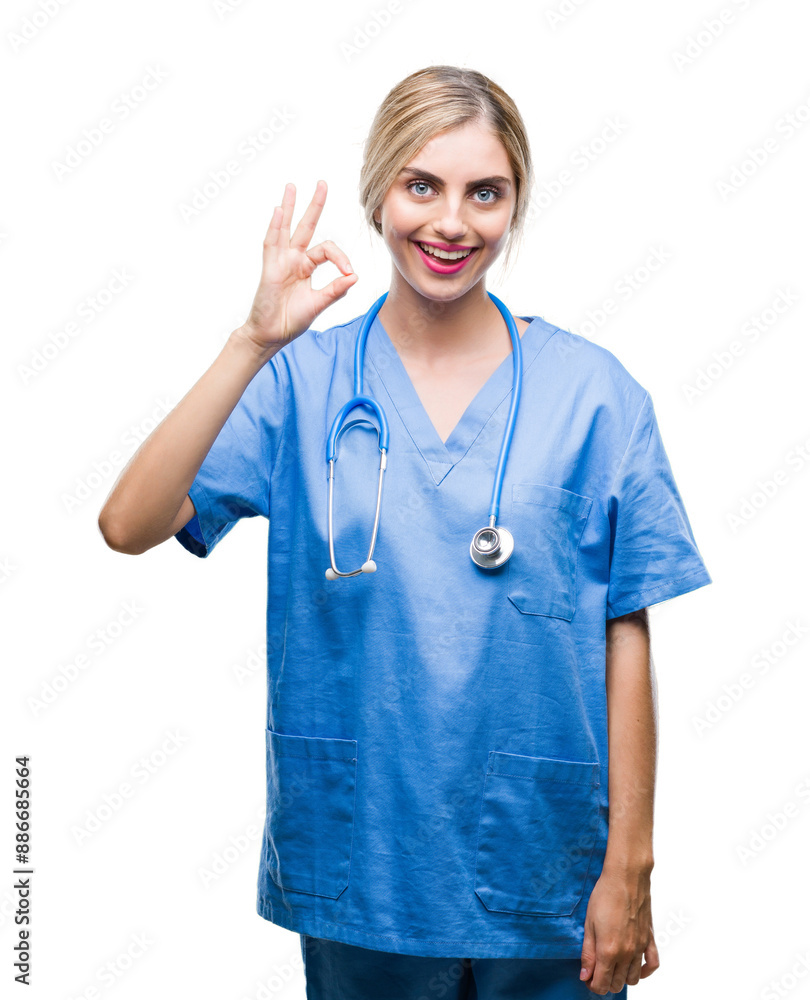 Young beautiful blonde doctor surgeon nurse woman over isolated background smiling positive doing ok sign with hand and fingers. Successful expression. Young beautiful blonde doctor surgeon nurse woman over isolated background smiling positive doing ok sign with hand and fingers. Successful expression.