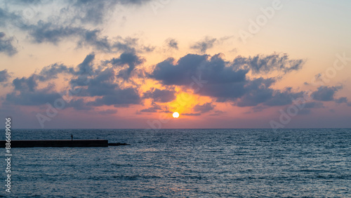 Panoramic view of the sunset over the Mediterranean Sea at Caesarea National Park in Israel.