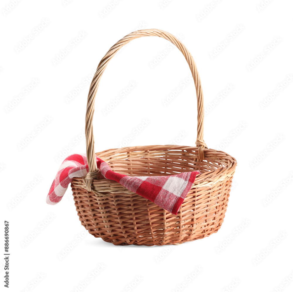 One picnic wicker basket with checkered napkin isolated on white One picnic wicker basket with checkered napkin isolated on white