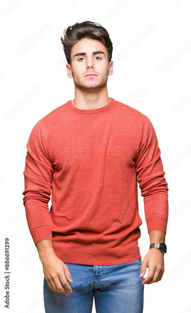 Fototapeta premium Young handsome man over isolated background Relaxed with serious expression on face. Simple and natural looking at the camera.
