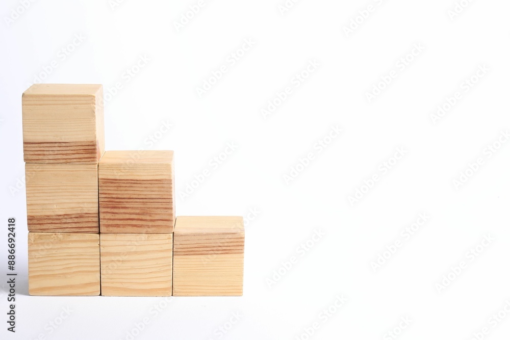 Many blank wooden cubes on white background, space for text Many blank wooden cubes on white background, space for text