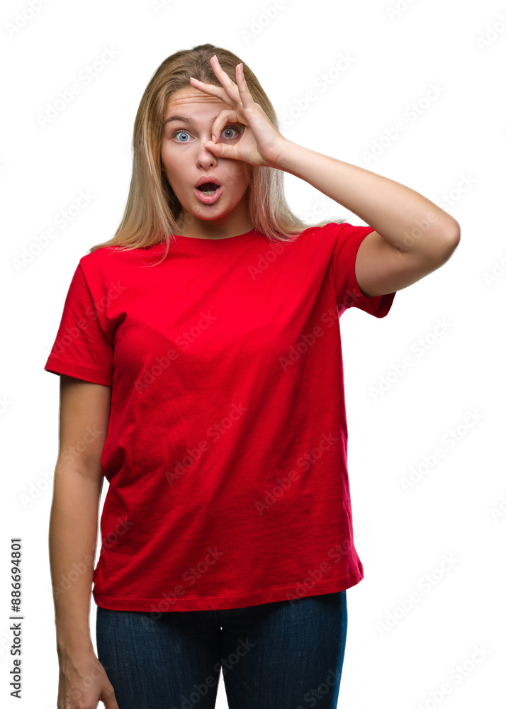Young caucasian woman over isolated background doing ok gesture shocked with surprised face, eye looking through fingers. Unbelieving expression. Young caucasian woman over isolated background doing ok gesture shocked with surprised face, eye looking through fingers. Unbelieving expression.