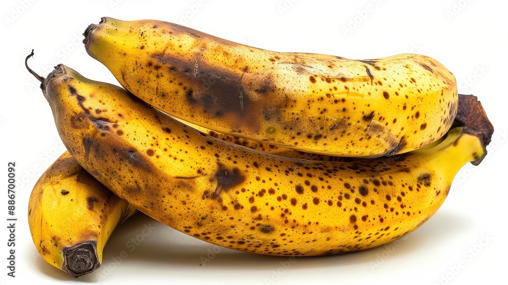 Isolated ripe bananas with high nutritional value on a white background suitable for text placement Isolated ripe bananas with high nutritional value on a white background suitable for text placement