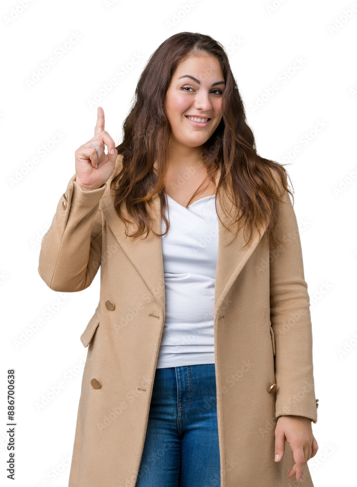 Beautiful plus size young woman wearing winter coat over isolated background pointing finger up with successful idea. Exited and happy. Number one. Beautiful plus size young woman wearing winter coat over isolated background pointing finger up with successful idea. Exited and happy. Number one.