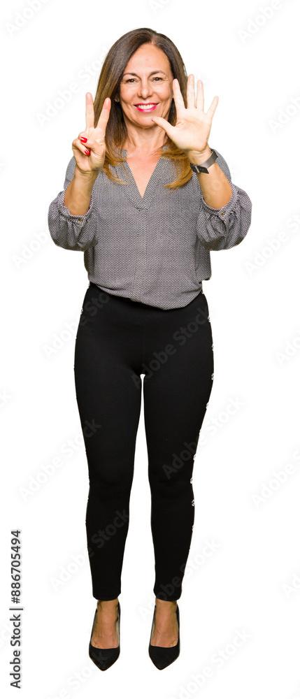 Beautiful middle age business woman showing and pointing up with fingers number seven while smiling confident and happy.