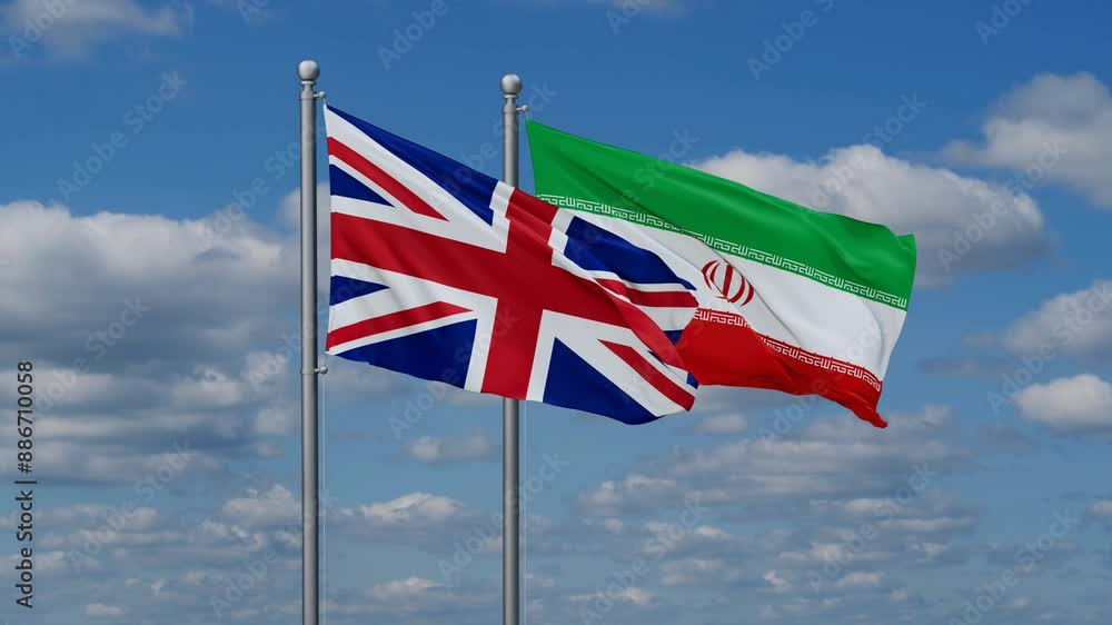 Iran and United Kingdom two flags waving together on blue sky, looped video Iran and United Kingdom two flags waving together on blue sky, looped video