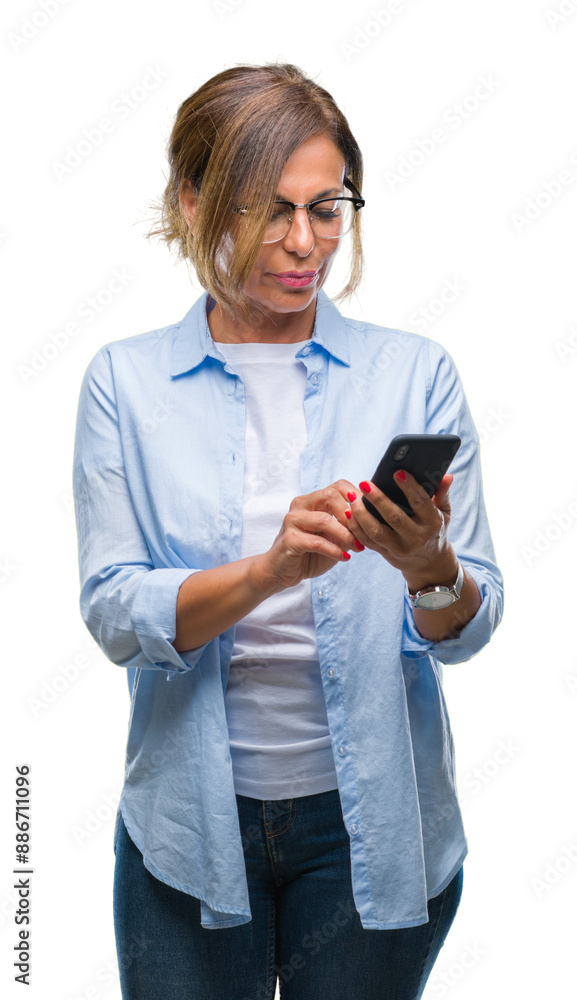 Middle age senior woman texting sending message using smartphone over isolated background with a confident expression on smart face thinking serious Middle age senior woman texting sending message using smartphone over isolated background with a confident expression on smart face thinking serious