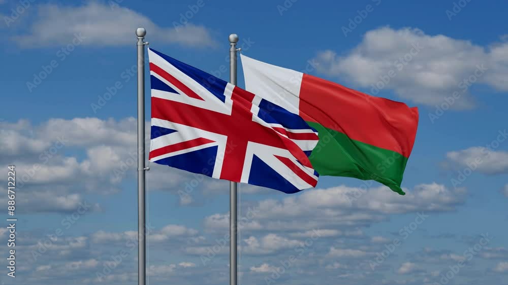 Madagascar and United Kingdom flags flying together, video concept of the relationship, two country relations concept Madagascar and United Kingdom flags flying together, video concept of the relationship, two country relations concept