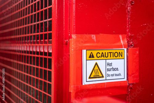 Wallpaper Mural "Hot surface" caution sign on the power generator machine engine. Safety sign and symbol for industrial, close-up and selective focus. Torontodigital.ca