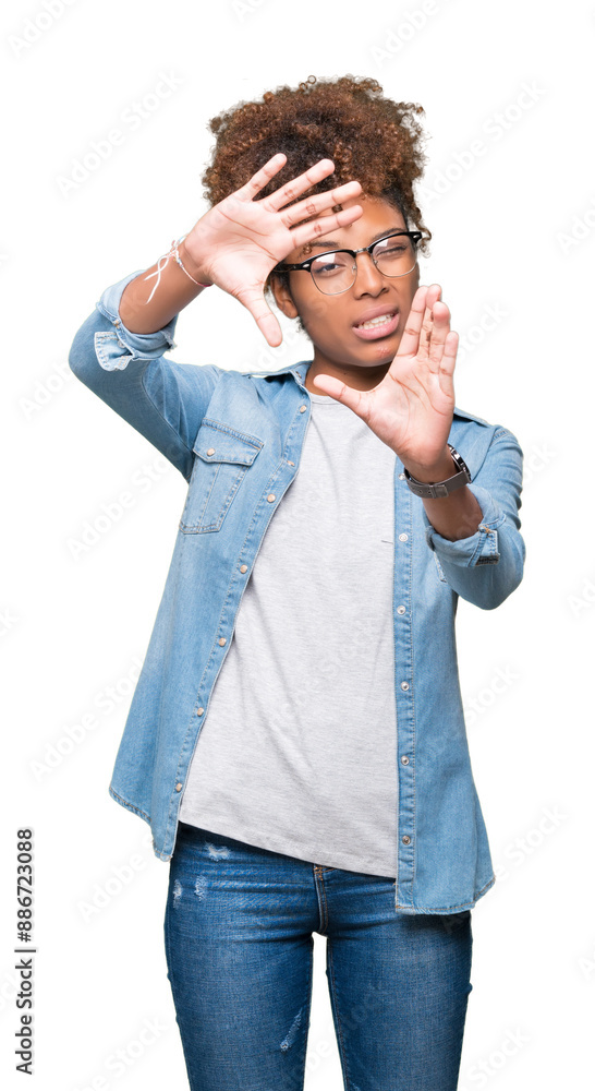 Beautiful young african american woman wearing glasses over isolated background Smiling doing frame using hands palms and fingers, camera perspective Beautiful young african american woman wearing glasses over isolated background Smiling doing frame using hands palms and fingers, camera perspective