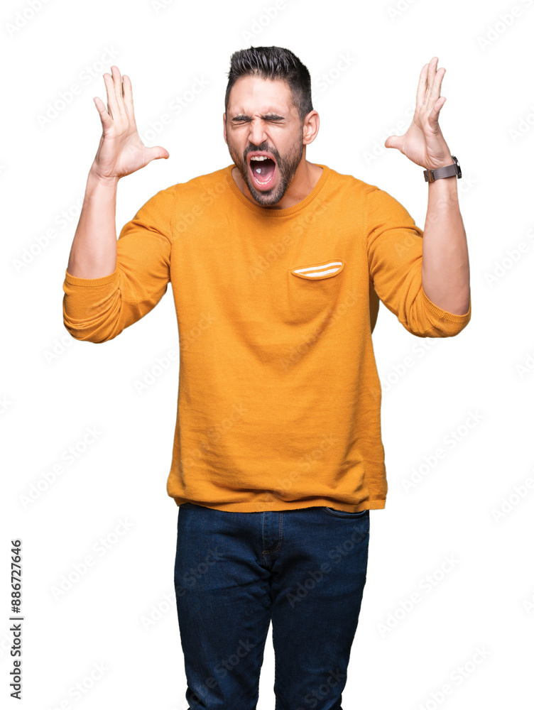 Young handsome man over isolated background celebrating mad and crazy for success with arms raised and closed eyes screaming excited. Winner concept Young handsome man over isolated background celebrating mad and crazy for success with arms raised and closed eyes screaming excited. Winner concept