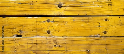 Wallpaper Mural A yellow wooden board with a line and two spots on the right is attached ideal as a copy space image Torontodigital.ca