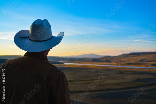Slika na platnu Cowboy looking into the distance Yellowsone